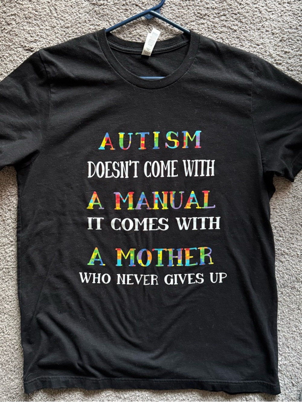 Bella Canvas Black T‑Shirt with Multicolor Lettering